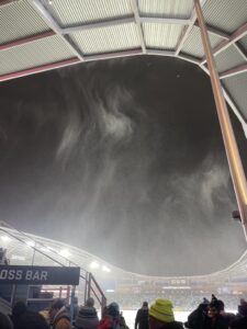 A cloud of snow whirls above Allianz Field